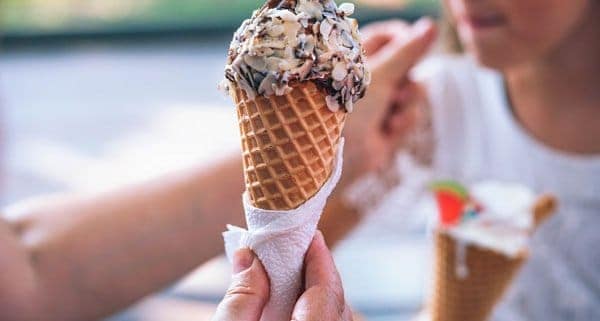 ice cream cone covered with almonds