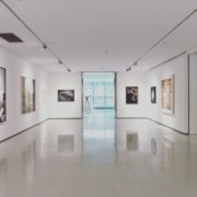 Museum hallway in Montreal with white walls and paintings